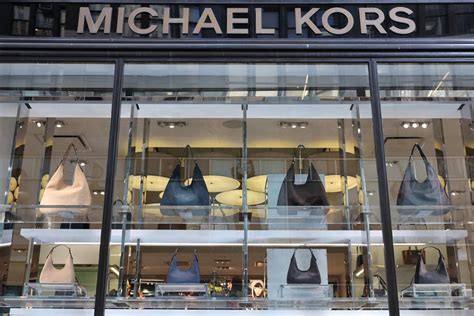 michael kors acquisition|tapestry capri merger news.